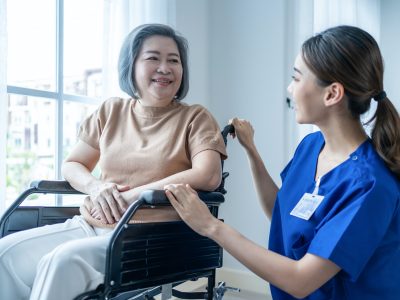 asian-nurse-take-care-senior-woman-on-wheelchair-at-nursing-home-care-.jpg